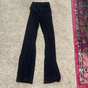 Black Aerie flare leggings with crisscross waistband. Size Small